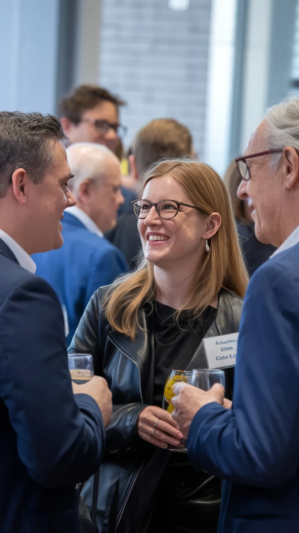 Attendees talking during a Bitcoin Poland networking break